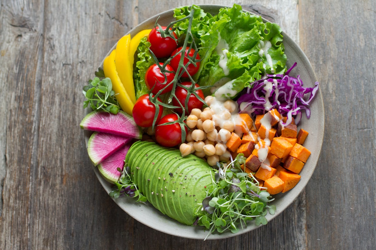Colourful healthy foods for weight loss laid out on a table